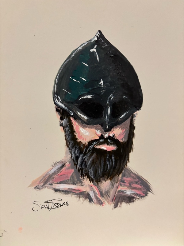 Portait of a bearded man wearing a helmet