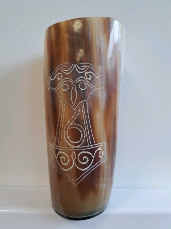 Drinking horn with mjolnir engraved on it