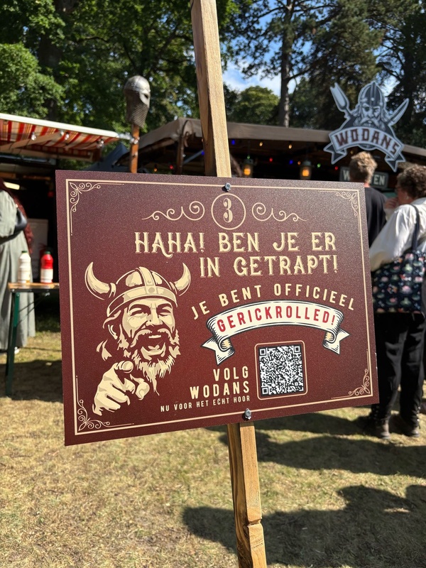 Promotional sign for Wodans