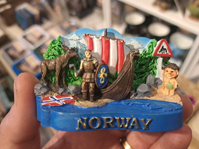 Norwegian souvenir with an elk, a Viking and his ship, and a troll