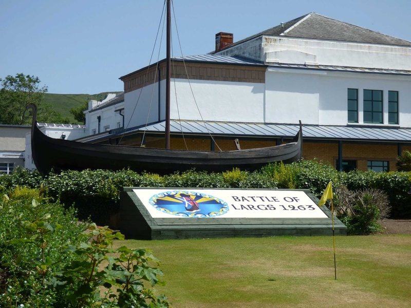 Replica Viking longboat and sign commemorating the Battle of Largs