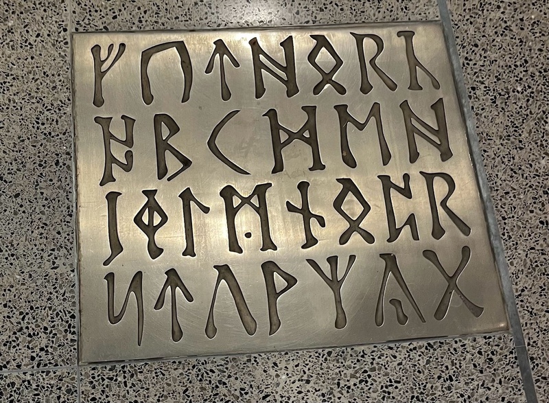 Metal plaque with Anglo-Saxon runes written in alphabetical order