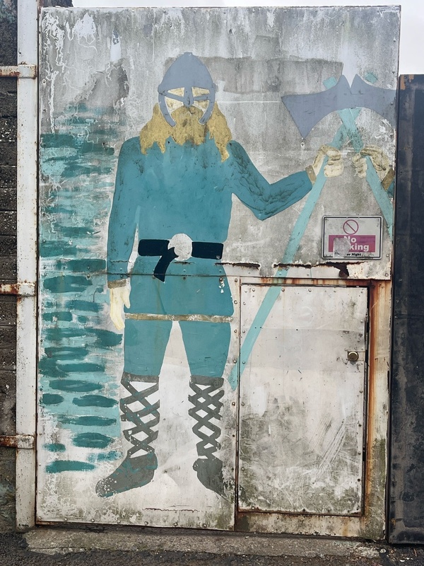 street art style painting of a blond Viking man