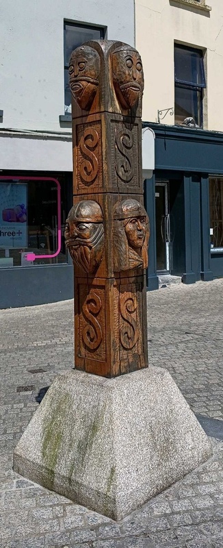 Hand-carved wooden Viking-style pillar