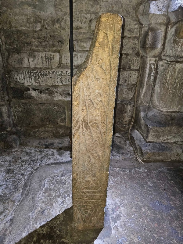 Carved stone cross shaft, Lastingham (UK) (left side)
