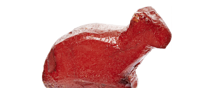 Amber figurine of a sitting cat from 	Birka