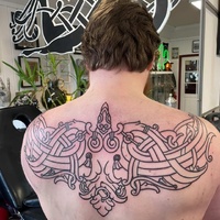 Tattoo with Norse inspired pattern