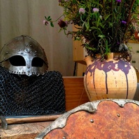 Shield, helmet and vase reproductions at Viking Valley (Gudvangen)