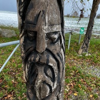 Viking face carved in wood