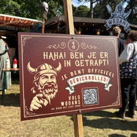 Promotional sign for Wodans