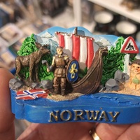 Norwegian souvenir with an elk, a Viking and his ship, and a troll