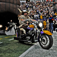 Photograph of rideout of Minnesota Vikings' Ragnar Mascot