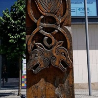 Hand-carved wooden Viking-style pillar of Odin